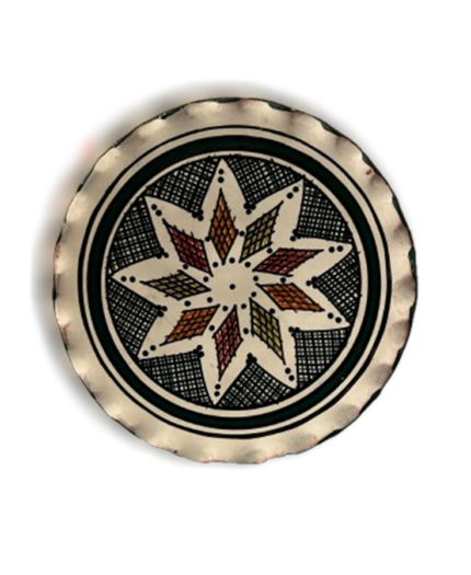 Hand-painted Moroccan ceramic decorative plate with a cream background, starburst design featuring red, orange, and yellow diamonds, and a scalloped edge.